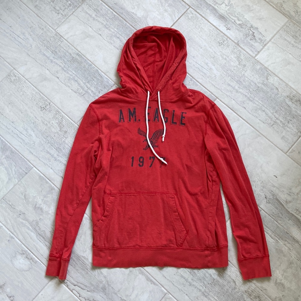 American Eagle orange light sweatshirt.